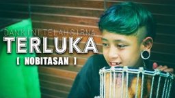 lirik lagu terluka nobitasan